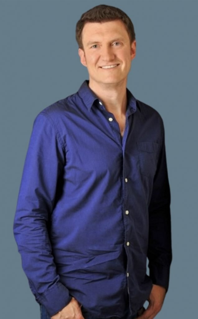 a man in a blue shirt